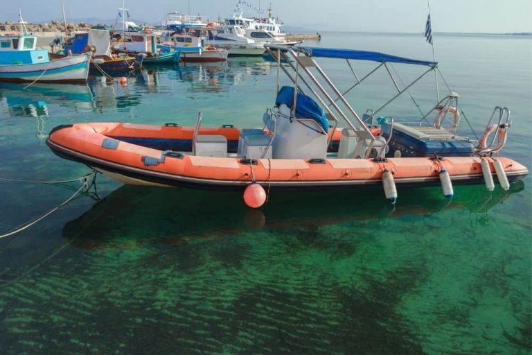 red-long-rigid-inflatable-boat-at-the-dock-768x512.jpg